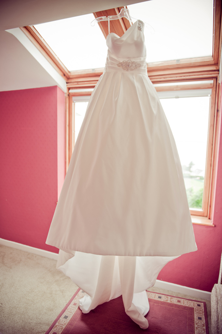 wedding dress hanging photo